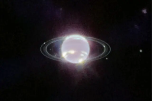 تصویری زیبا از قمرهای سیاره نپتون+عکس