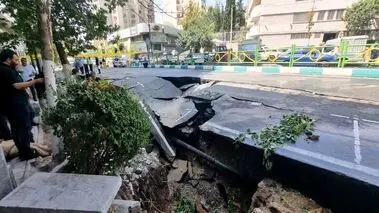 فرونشست زمین در تهران خودروها را بلعید!+عکس