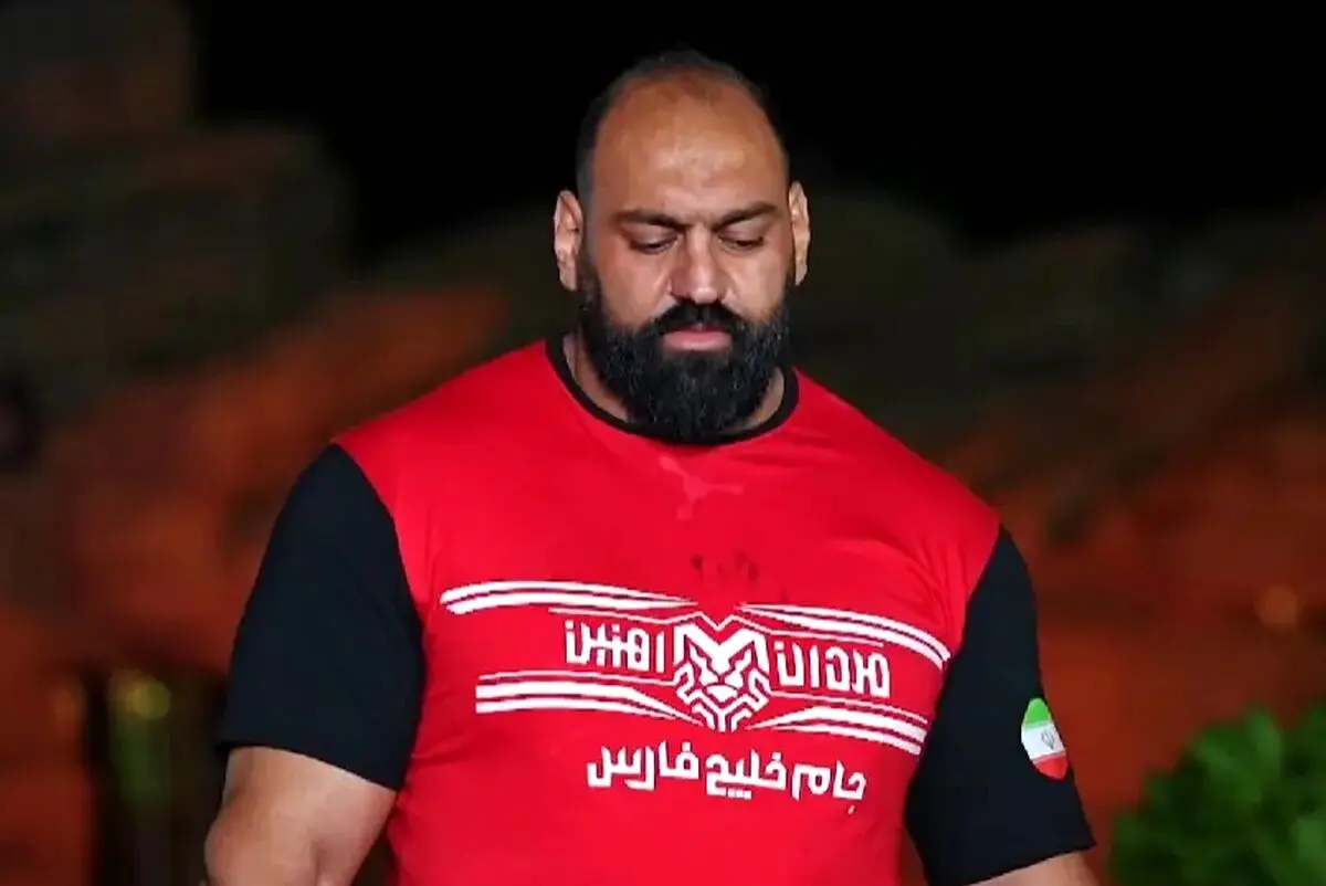 قوی‌ترین مرد ایران: طرفدار پرسپولیس و تراکتور هستم + فیلم
