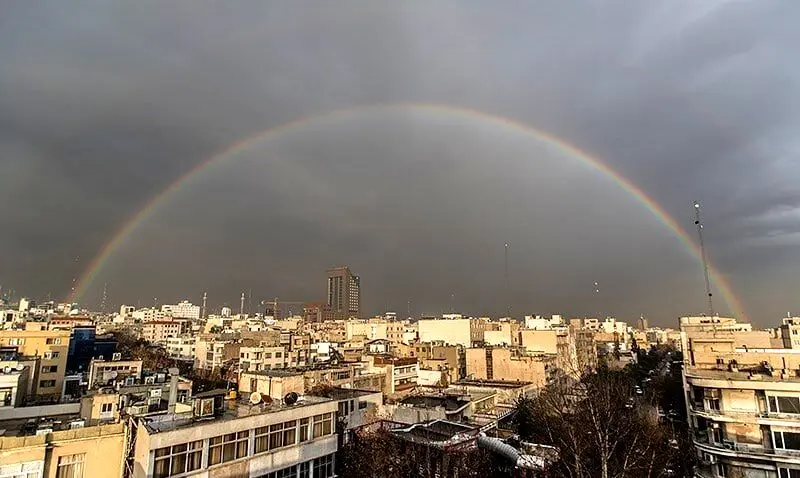 اولین باران و رنگین‌ کمان پاییزی در تهران+ فیلم