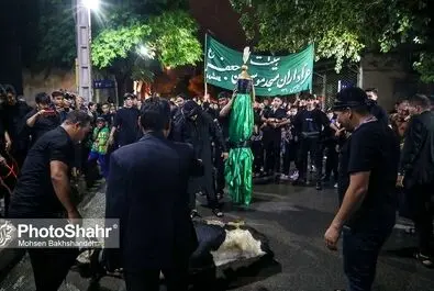 مراسم علم کشی مهاجران افغانستانی در مشهد