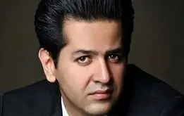 خواننده ایرانی:حاضرم در آمریکا ظرف بشورم اما به ایران برنگردم!+فیلم