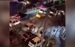 برهنه شدن زن جوان روی ماشین پلیس در مشهد + فیلم